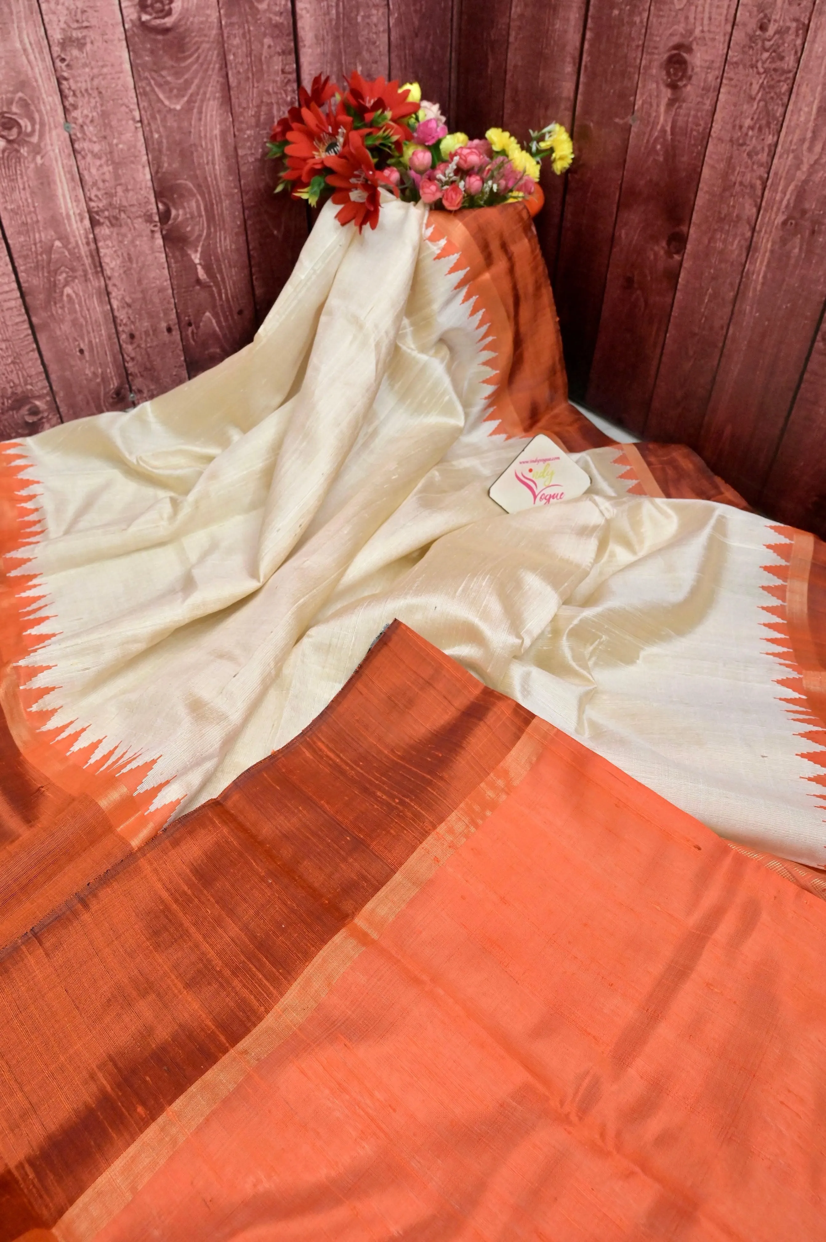 Offwhite and Orange Color Pure Raw Silk Saree with Temple Border