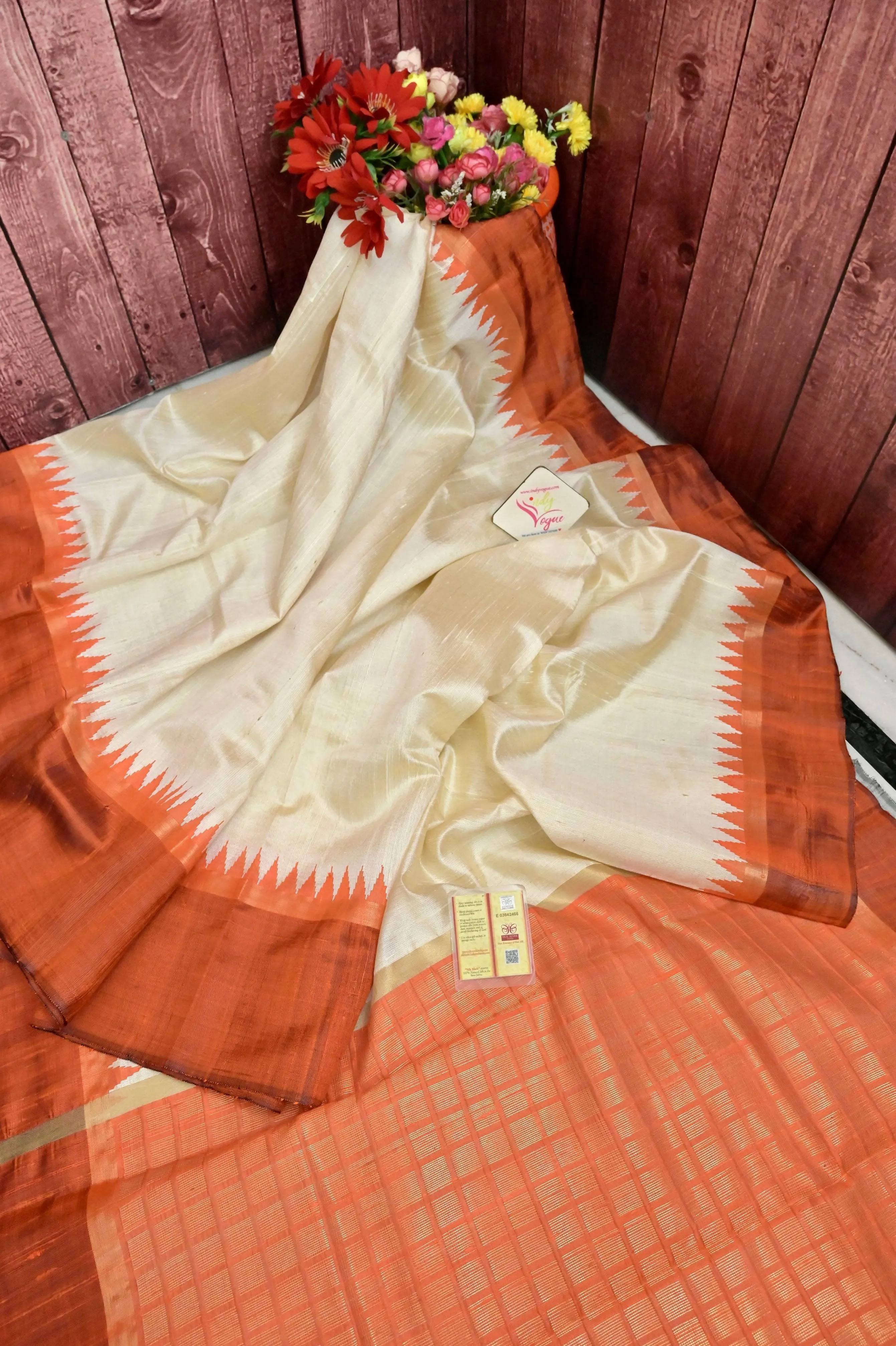 Offwhite and Orange Color Pure Raw Silk Saree with Temple Border