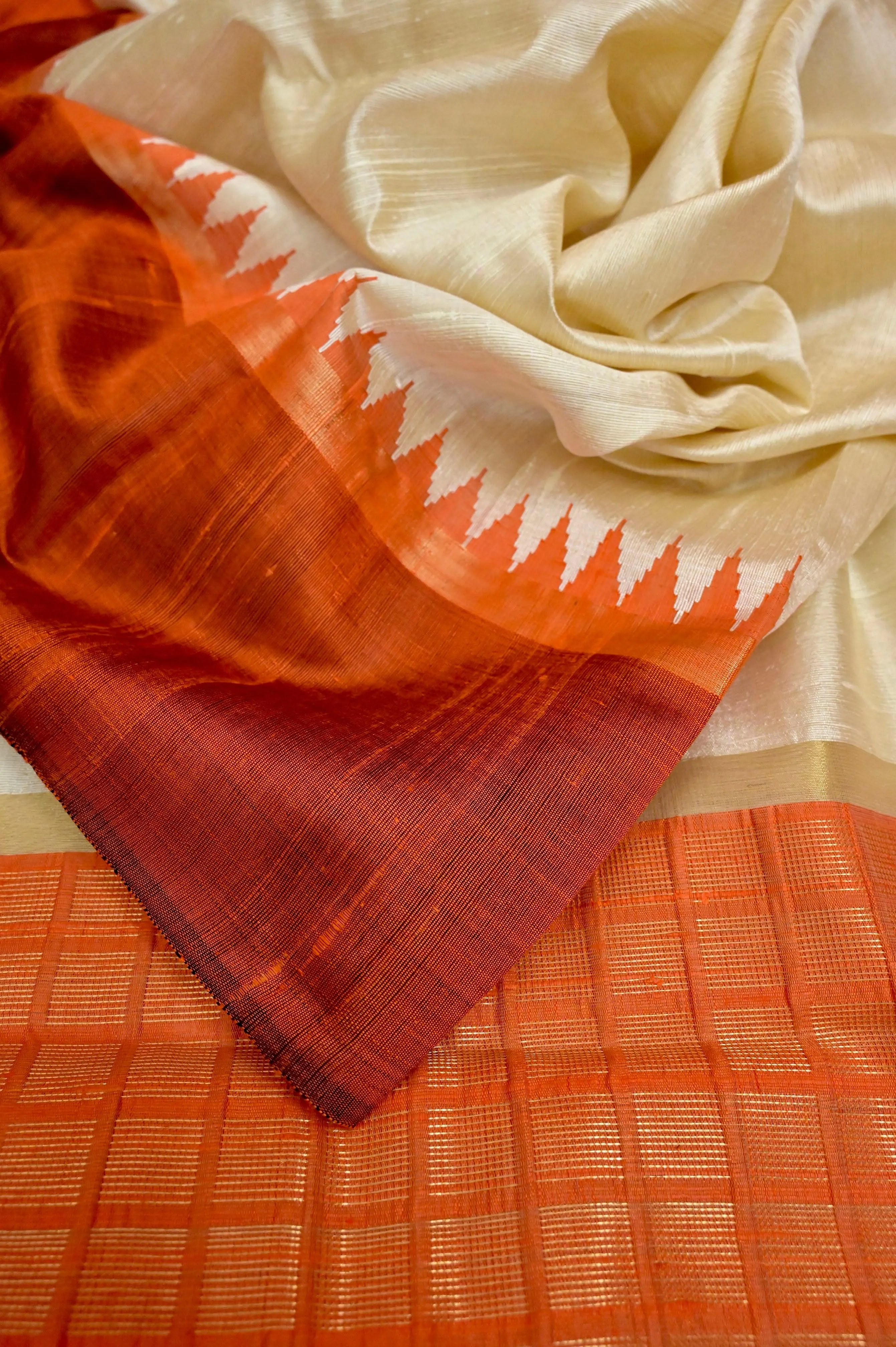 Offwhite and Orange Color Pure Raw Silk Saree with Temple Border